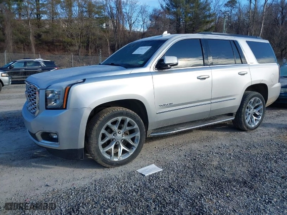 2019 GMC Yukon SLT with VIN 1GKS2BKC0KR107722, listed as a IAAI auction lot 41663341 with 111,782 mi miles. Bid and sale history available at carsss.com. Image 2.