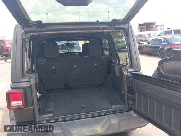 2019 Jeep Wrangler Unlimited Sport S with VIN 1C4HJXDG9KW653488, listed as a IAAI auction lot 42275297 with Not provided miles and . Bid and sale history available at DreamBid. Image 17.