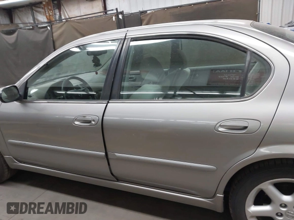 2002 Nissan Maxima GLE with VIN JN1DA31D32T422365, listed as a IAAI auction lot 41644137 with 165,157 mi miles and . Bid and sale history available at DreamBid. Image 14.