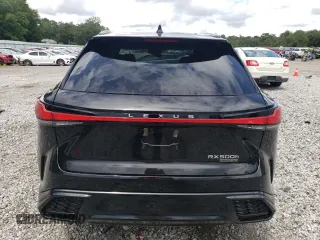 2023 Lexus RX with VIN 2T2BCMEA0PC007390, listed as a Copart auction lot 64783984 with 9,936 mi miles and Salvage Title. Bid and sale history available at carsss.com. Image 6.