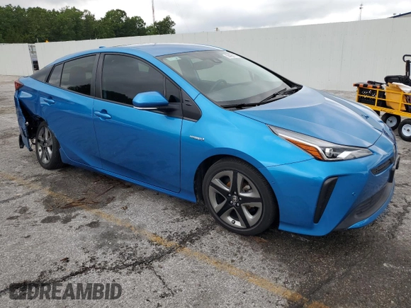 2021 Toyota Prius L Eco with VIN JTDKAMFU1M3146516, listed as a Copart auction lot 58406175 with 19,911 mi miles and Salvage title. Bid and sale history available at DreamBid. Image 4.