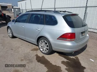 2012 Volkswagen Jetta SportWagen TDI w/Sunroof with VIN 3VWPL7AJ4CM686399, listed as a IAAI auction lot 42036340 with 89,780 mi miles. Bid and sale history available at carsss.com. Image 3.