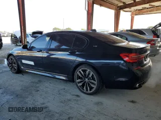 2019 BMW 7 Series M760i xDrive with VIN WBA7H6C55KG614986, listed as a Copart auction lot 84023164 with 59,222 mi miles and Non Repairable. Bid and sale history available at carsss.com. Image 2.