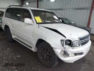 1999 Lexus LX 470 with VIN JT6HT00W1X0056660, listed as a IAAI auction lot 41597666 with 242,362 mi miles and . Bid and sale history available at DreamBid. Image 1.