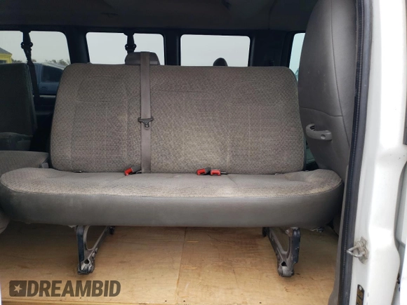 2012 Chevrolet Express Passenger 1LT with VIN 1GAZGYFG8C1174282, listed as a Copart auction lot 86012024 with 170,680 mi miles and Salvage title. Bid and sale history available at DreamBid. Image 11.