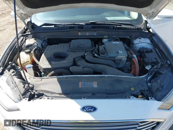 2017 Ford Fusion Hybrid SE z VIN 3FA6P0LU8HR396572, wystawiony jako IAAI lot #41997684 z przebiegiem 272 803 mil mil oraz . Historia ofert i sprzedaży dostępna na DreamBid. Obrazek 10.