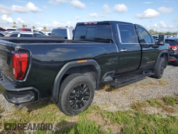 2023 GMC Sierra 3500HD Denali z VIN 1GT49WEY9PF135123, wystawiony jako Copart lot #74175484 z przebiegiem Nie podano mil oraz Nie do naprawy • Non repairable. Historia ofert i sprzedaży dostępna na DreamBid. Obrazek 3.