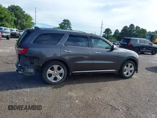 2015 Dodge Durango SXT with VIN 1C4RDHAG0FC771247, listed as a IAAI auction lot 42463389 with 171,668 mi miles and . Bid and sale history available at DreamBid. Image 14.