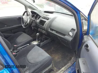2007 Honda Fit Sport z VIN JHMGD38697S066329, wystawiony jako IAAI lot #42312163 z przebiegiem 174 935 mil mil oraz . Historia ofert i sprzedaży dostępna na DreamBid. Obrazek 5.