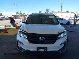 2022 Honda Pilot Special Edition with VIN 5FNYF5H29NB018557, listed as a IAAI auction lot 41402547 with 22,935 mi miles and . Bid and sale history available at carsss.com. Image 12.