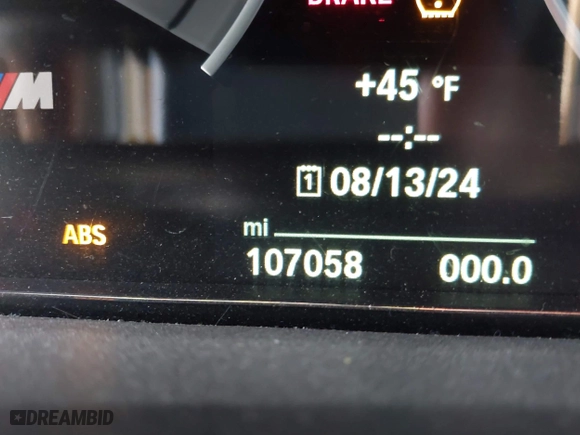 2015 BMW M4 with VIN WBS3R9C57FK334921, listed as a IAAI auction lot 41869773 with 107,058 mi miles. Bid and sale history available at carsss.com. Image 15.