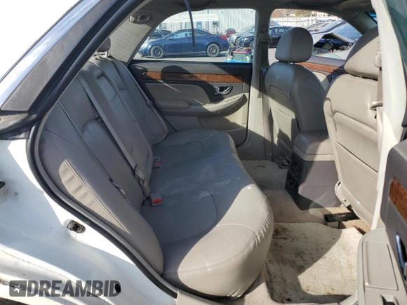 2005 Hyundai XG z VIN KMHFU45E85A392619, wystawiony jako Copart lot #78087664 z przebiegiem 71 256 mil mil oraz Szkody całkowita. Historia ofert i sprzedaży dostępna na DreamBid. Obrazek 10.