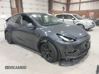 2023 Tesla Model Y Long Range with VIN 7SAYGAEE2PF755674, listed as a IAAI auction lot 41890025 with 24,783 mi miles and . Bid and sale history available at DreamBid. Image 1.