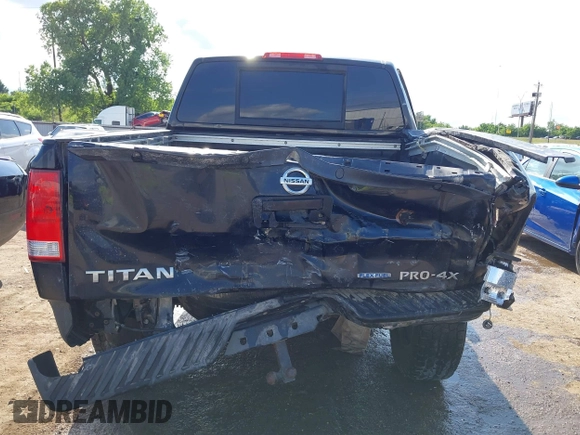 2013 Nissan Titan Pro-4X with VIN 1N6BA0EC4DN305032, listed as a IAAI auction lot 42341681 with 118,251 mi miles and . Bid and sale history available at DreamBid. Image 16.