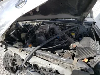 2004 Nissan Frontier SC z VIN 1N6MD29Y64C422771, wystawiony jako Copart lot #47132115 z przebiegiem 151 009 mil mil oraz Szkoda całkowita • Salvage title. Historia ofert i sprzedaży dostępna na DreamBid. Obrazek 14.