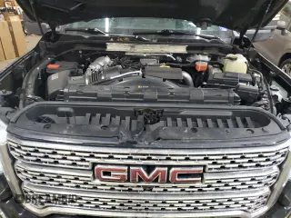 2020 GMC Sierra 3500HD Denali z VIN 1GT49WEY3LF279387, wystawiony jako Copart lot #84054454 z przebiegiem 140 648 mil mil oraz Szkoda całkowita • Salvage title. Historia ofert i sprzedaży dostępna na DreamBid. Obrazek 11.