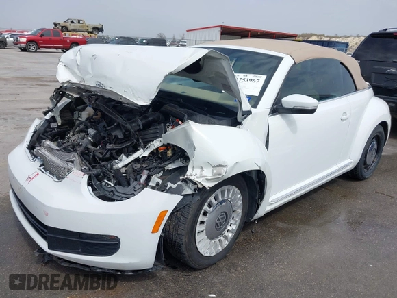 2015 Volkswagen Beetle 1.8T w/Tech with VIN 3VW517AT4FM812294, listed as a IAAI auction lot 41753967 with 59,857 mi miles and . Bid and sale history available at DreamBid. Image 17.