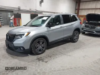 2021 Honda Passport EX-L with VIN 5FNYF8H56MB000107, listed as a IAAI auction lot 41868429 with 66,572 mi miles and . Bid and sale history available at DreamBid. Image 19.