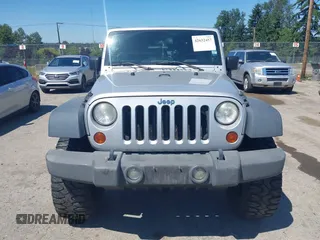 2008 Jeep Wrangler Unlimited X with VIN 1J4GA39148L596727, listed as a IAAI auction lot 42632457 with 175,000 mi miles and . Bid and sale history available at DreamBid. Image 12.