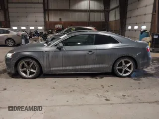 2018 Audi A5 Premium Plus with VIN WAUTNAF50JA011354, listed as a IAAI auction lot 41396659 with 74,936 mi miles and . Bid and sale history available at DreamBid. Image 14.