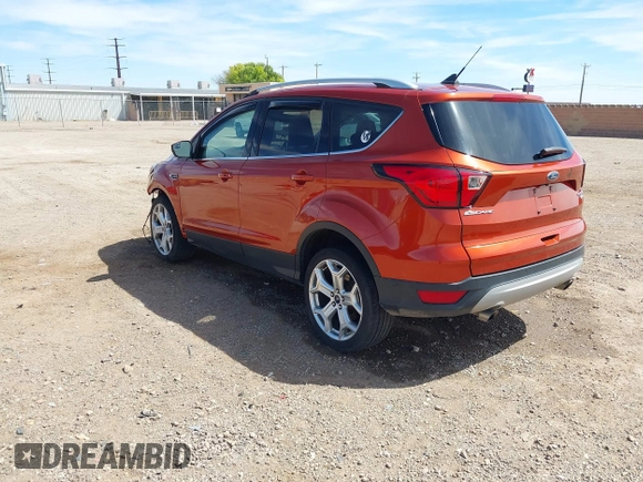 2019 Ford Escape Titanium with VIN 1FMCU9J92KUB28895, listed as a IAAI auction lot 42065235 with 112,305 mi miles and . Bid and sale history available at DreamBid. Image 3.