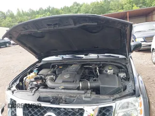 2012 Nissan Pathfinder S z VIN 5N1AR1NN6CC633279, wystawiony jako IAAI lot #42523354 z przebiegiem 141 256 mil mil oraz . Historia ofert i sprzedaży dostępna na DreamBid. Obrazek 10.