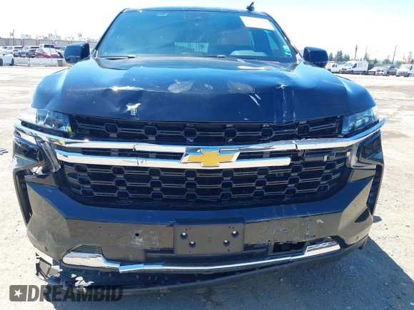 2023 Chevrolet Suburban LS z VIN 1GNSCBKD3PR457569, wystawiony jako IAAI lot #42225571 z przebiegiem 53 410 mil mil oraz . Historia ofert i sprzedaży dostępna na DreamBid. Obrazek 19.