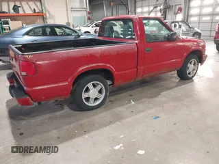 1999 Chevrolet S-10 LS with VIN 1GCCS1449XK163562, listed as a IAAI auction lot 40983215 with 57,489 mi miles. Bid and sale history available at carsss.com. Image 4.
