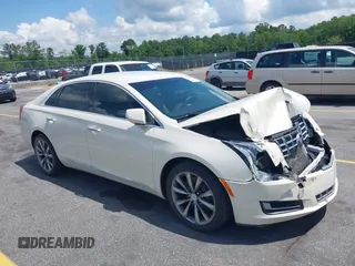 2013 Cadillac XTS z VIN 2G61N5S38D9146817, wystawiony jako IAAI lot #42233923 z przebiegiem 63 766 mil mil oraz . Historia ofert i sprzedaży dostępna na DreamBid. Obrazek 1.