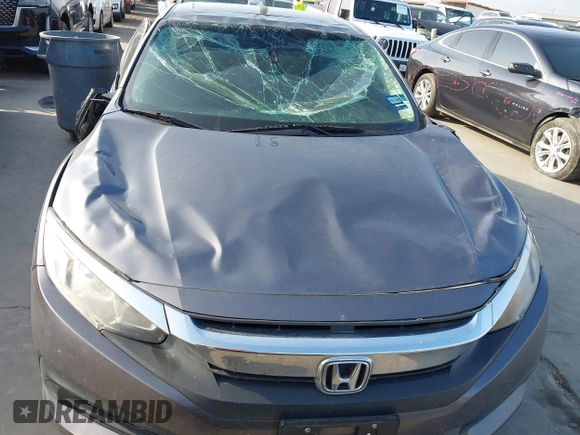 2017 Honda Civic EX z VIN 19XFC2F7XHE056273, wystawiony jako IAAI lot #42087934 z przebiegiem 95 871 mil mil oraz . Historia ofert i sprzedaży dostępna na DreamBid. Obrazek 13.