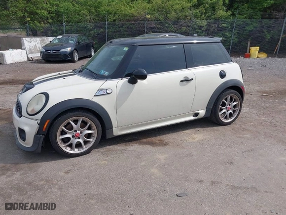 2008 MINI Cooper Hardtop S with VIN WMWMF73578TV33406, listed as a IAAI auction lot 42081596 with 120,183 mi miles. Bid and sale history available at carsss.com. Image 2.