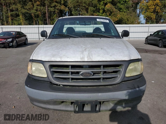 2003 Ford F-150 XL with VIN 1FTRF17W03NA39409, listed as a Copart auction lot 78578434 with 142,299 mi miles and Salvage Title. Bid and sale history available at DreamBid. Image 5.