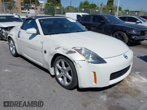 2005 Nissan 350Z Touring z VIN JN1AZ36A45M759863, wystawiony jako IAAI lot #41989643 z przebiegiem 36 758 mil mil oraz . Historia ofert i sprzedaży dostępna na DreamBid. Obrazek 1.