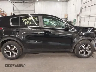 2020 Kia Sportage LX with VIN KNDPMCACXL7804797, listed as a IAAI auction lot 42011299 with 49,793 mi miles and . Bid and sale history available at carsss.com. Image 14.