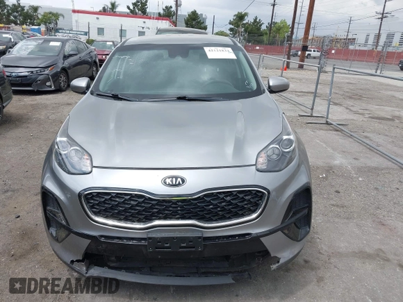 2020 Kia Sportage LX with VIN KNDPM3AC1L7761371, listed as a IAAI auction lot 42121834 with 38,411 mi miles and . Bid and sale history available at DreamBid. Image 12.