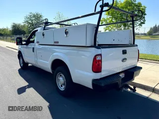 2014 Ford Super Duty F-250 SRW XL with VIN 1FTBF2A65EEA79309, listed as a Copart auction lot 54507845 with 224,094 mi miles and Clean Title. Bid and sale history available at carsss.com. Image 3.