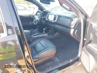 2021 Toyota Tacoma SR с VIN 3TMCZ5AN3MM423247, выставлен на аукционе IAAI как лот 42031290 с пробегом 27 913 миль миль и . История ставок и продаж доступна на DreamBid. Изображение 5.