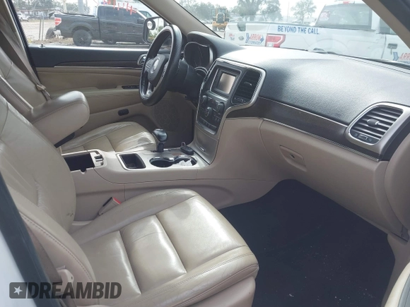 2014 Jeep Grand Cherokee Limited with VIN 1C4RJEBG1EC403972, listed as a IAAI auction lot 41455012 with 241,168 mi miles and . Bid and sale history available at DreamBid. Image 5.