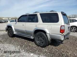 1999 Toyota 4Runner Limited with VIN JT3GN87R5X0115971, listed as a Copart auction lot 50742105 with 323,635 mi miles and Salvage Title. Bid and sale history available at DreamBid. Image 2.