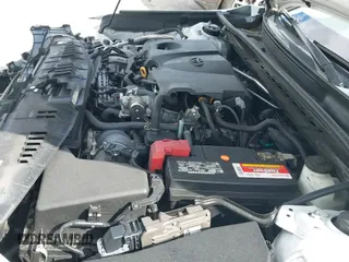 2021 Toyota Camry LE with VIN 4T1C11AK8MU601313, listed as a IAAI auction lot 43383218 with 34,384 mi miles and . Bid and sale history available at DreamBid. Image 19.