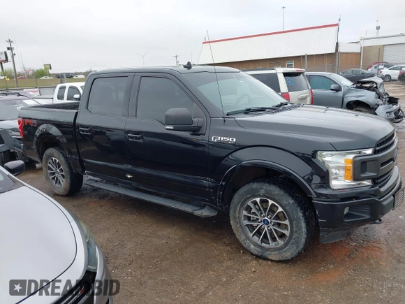 2019 Ford F-150 XL with VIN 1FTEW1EP7KKF18114, listed as a IAAI auction lot 41957860 with 106,017 mi miles and . Bid and sale history available at DreamBid. Image 14.
