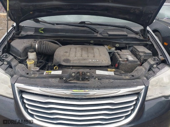 2013 Chrysler Town & Country Touring-L with VIN 2C4RC1CG6DR714885, listed as a IAAI auction lot 41906519 with 159,979 mi miles. Bid and sale history available at carsss.com. Image 10.