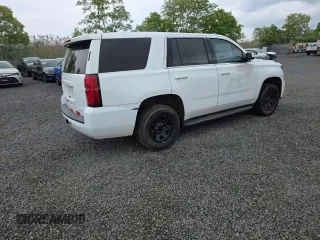 2018 Chevrolet Tahoe Commercial z VIN 1GNSKDEC6JR359306, wystawiony jako Copart lot #57100015 z przebiegiem 154 075 mil mil oraz Czysty tytuł • Clean title. Historia ofert i sprzedaży dostępna na DreamBid. Obrazek 4.