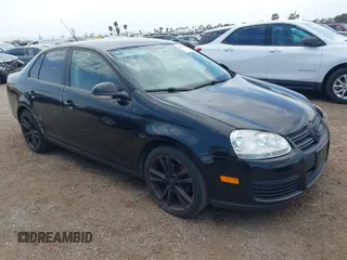 2010 Volkswagen Jetta Sedan S with VIN 3VWJZ7AJ2AM060044, listed as a IAAI auction lot 42023971 with 106,228 mi miles. Bid and sale history available at carsss.com. Image 1.