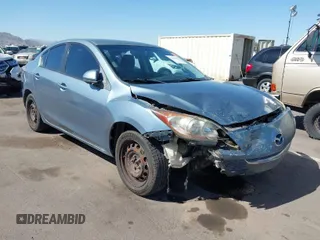 2010 Mazda Mazda3 i Touring with VIN JM1BL1SG5A1164355, listed as a IAAI auction lot 42044865 with 127,809 mi miles. Bid and sale history available at carsss.com. Image 1.