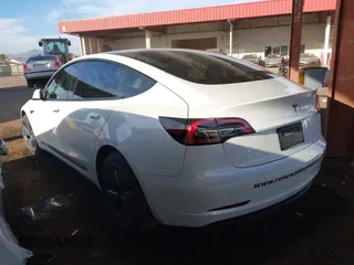 2022 Tesla Model 3 Long Range with VIN 5YJ3E1EB1NF236969, listed as a IAAI auction lot 41525117 with 24,215 mi miles and . Bid and sale history available at DreamBid. Image 3.