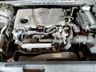 2019 Toyota Camry LE with VIN 4T1B11HK0KU753746, listed as a Copart auction lot 71014165 with 128,564 mi miles and Salvage title. Bid and sale history available at DreamBid. Image 13.