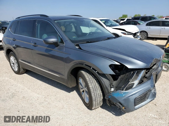 2018 Volkswagen Tiguan SEL with VIN 3VV3B7AX3JM010677, listed as a Copart auction lot 50615395 with 7,559 mi miles and Salvage Title. Bid and sale history available at DreamBid. Image 4.