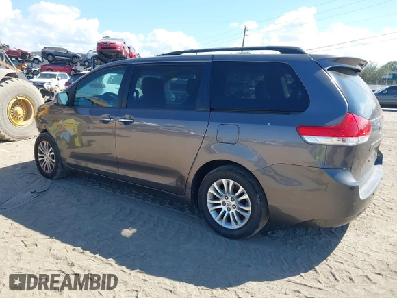 2012 Toyota Sienna XLE AAS with VIN 5TDYK3DC1CS186331, listed as a IAAI auction lot 41545031 with 240,788 mi miles and . Bid and sale history available at DreamBid. Image 3.