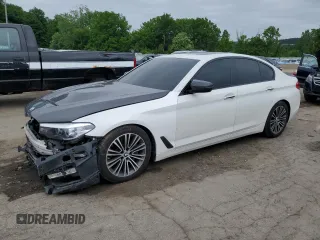 2017 BMW 5 Series 530i xDrive with VIN WBAJA7C39HG906552, listed as a Copart auction lot 60874505 with 99,049 mi miles and Salvage title. Bid and sale history available at DreamBid. Image 1.